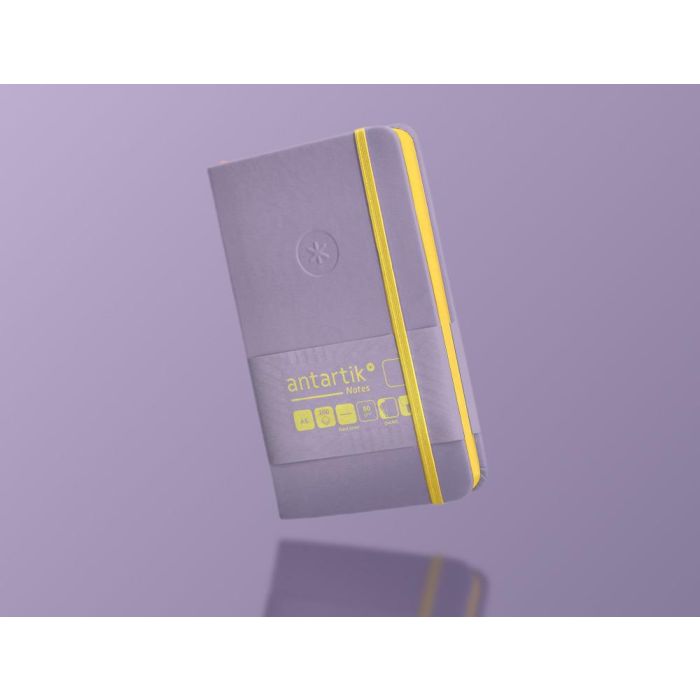 Cuaderno Con Gomilla Antartik Notes Tapa Dura A6 Hojas Lisas Morado Y Amarillo 100 Hojas 80 gr Fsc 9