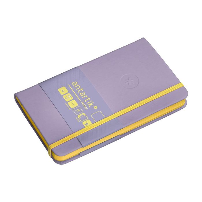 Cuaderno Con Gomilla Antartik Notes Tapa Dura A6 Hojas Lisas Morado Y Amarillo 100 Hojas 80 gr Fsc 5