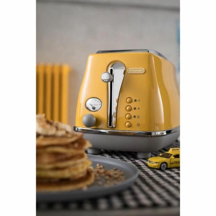 DELONGHI ICONA CAPITALS Tostadora 2 rebanadas - 900W - Tostadora 3 funciones - Calentador de repostería incluido - Amarillo 2