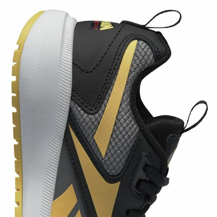 Reebok negro con online dorado