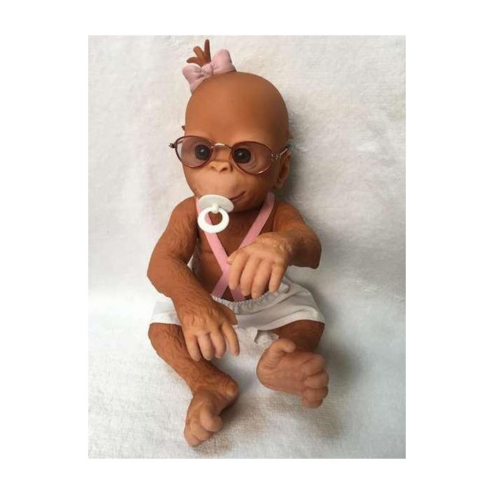 Muñeco chimpancé bebé con gafas, chupete y vestido 29 cm - modelos surtidos Muñeco chimpancé bebé con gafas, chupete y vestido 29 cm - modelos surtidos