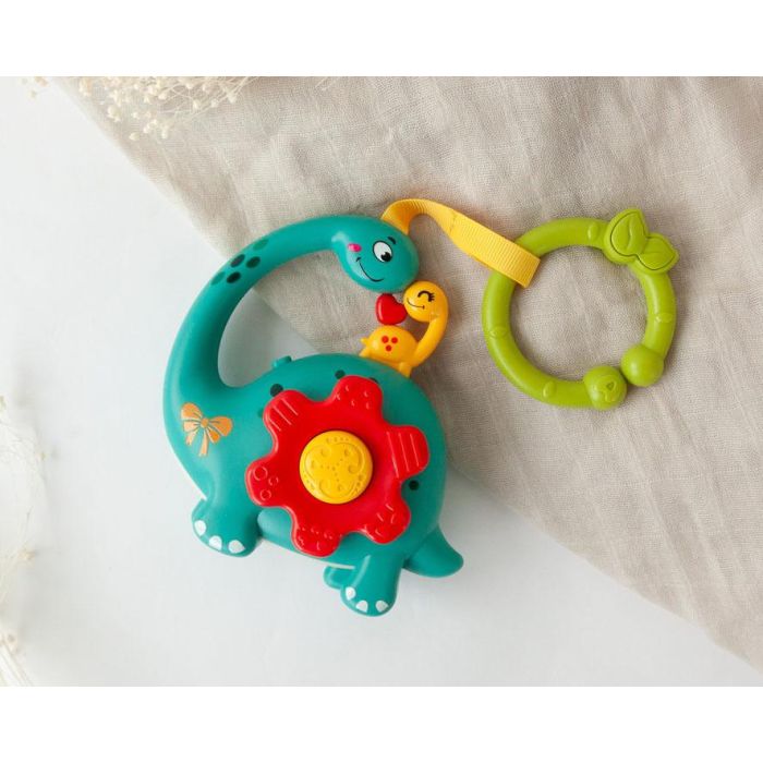 KioKids Dinosaurio Musical Interactivo 7 Melodías para Bebé +6 meses, Motricidad Fina, con Anilla para Cuna/Carrito, Multicolor