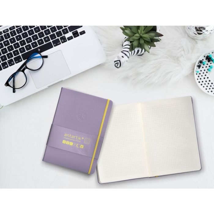 Cuaderno Con Gomilla Antartik Notes Tapa Dura A5 Hojas Cuadricula Morado Y Amarillo 100 Hojas 80 gr Fsc 10