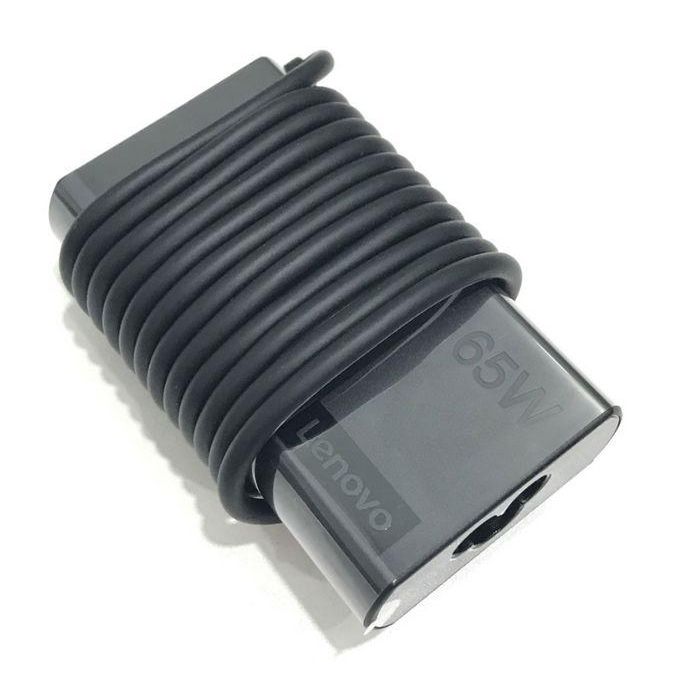 Lenovo 65W power adapter for notebooks, supports multiple output voltages: 20V, 15V, 9V, 5V, features 3 ports for versatile use. 4 Lenovo 65W power adapter for notebooks, supports multiple output voltages: 20V, 15V, 9V, 5V, features 3 ports for versatile use. 4