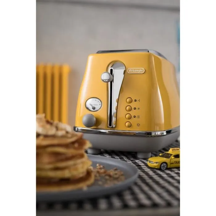 Delonghi DEL8004399762732 Tostadora 2 rebanadas 900W Tostadora 3 funciones Calentador de repostería incluido Amarillo 4