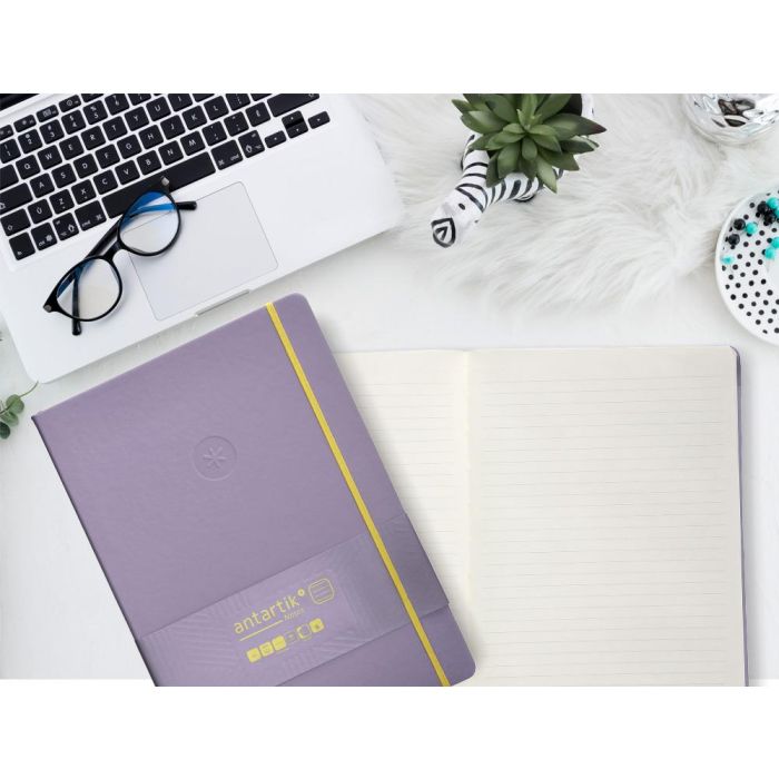 Cuaderno Con Gomilla Antartik Notes Tapa Dura A4 Hojas Rayas Morado Y Amarillo 100 Hojas 80 gr Fsc 9