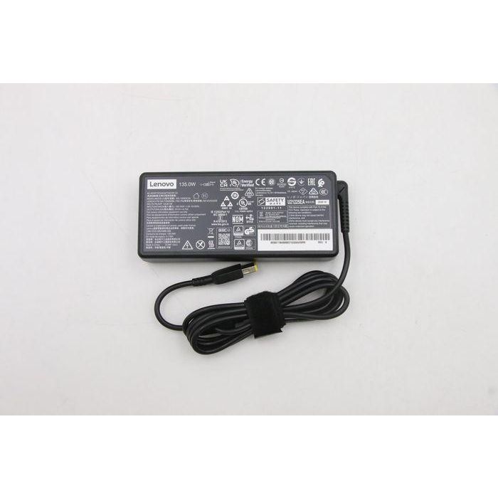 Lenovo 135W AC adapter charger for Lenovo devices, input 100-240VAC, slim-tip connector, energy efficient, portable design. 1