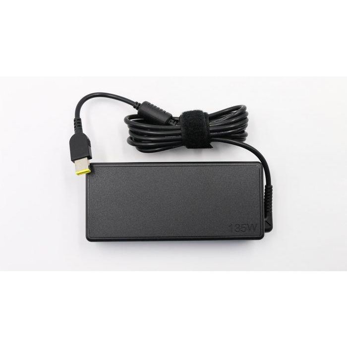 Lenovo 135W AC adapter for ThinkPad devices, input 100-240V, slim-tip charging port, compact design. Lenovo 135W AC adapter for ThinkPad devices, input 100-240V, slim-tip charging port, compact design.