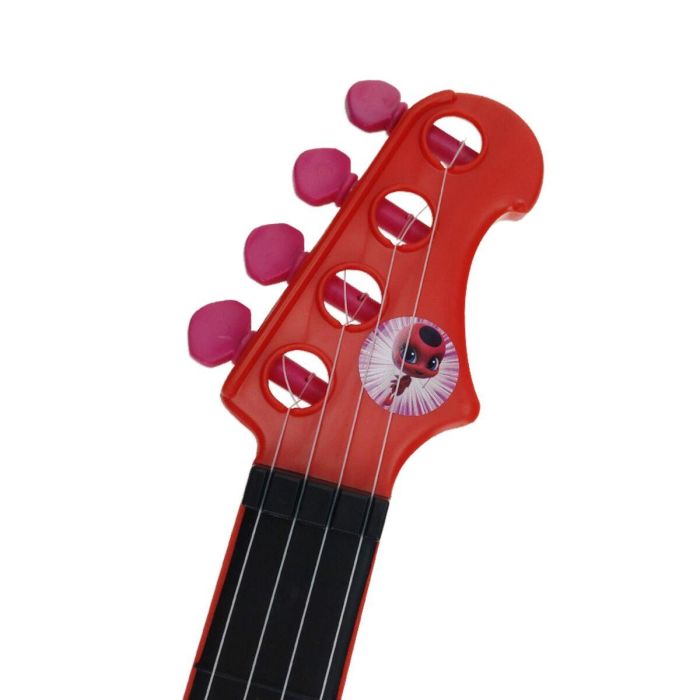 Microfono de pie con amplificador y guitarra lady bug 3