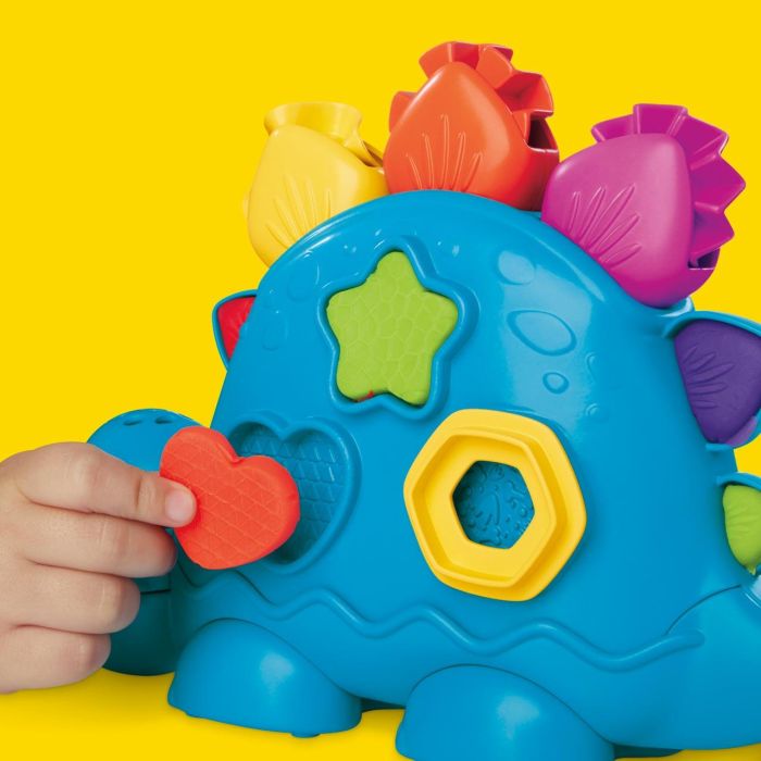 Play-Doh Dinosaurio Set de Juego Formas y Colores con 3 Cortadores, Ruedas, Rodillo y 6 Botes de Plastilina 340g Edad +2 años 3 Play-Doh Dinosaurio Set de Juego Formas y Colores con 3 Cortadores, Ruedas, Rodillo y 6 Botes de Plastilina 340g Edad +2 años 3