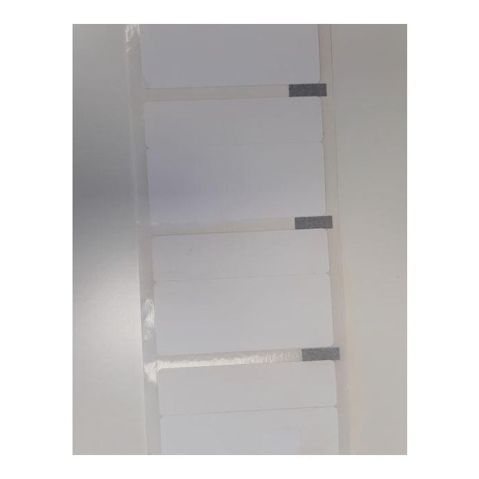 Capture Label 70x30x17 - Core 25. DIameter 100 mm. White. Uncoated. DT. Permanent. 670 labels per roll. 4 rolls per box. Black Mark, no perforation. Mother Daughter label. Each label is cut in two halves. The Mother label measures 70 x 30mm and the Daught Capture Label 70x30x17 - Core 25. DIameter 100 mm. White. Uncoated. DT. Permanent. 670 labels per roll. 4 rolls per box. Black Mark, no perforation. Mother Daughter label. Each label is cut in two halves. The Mother label measures 70 x 30mm and the Daught