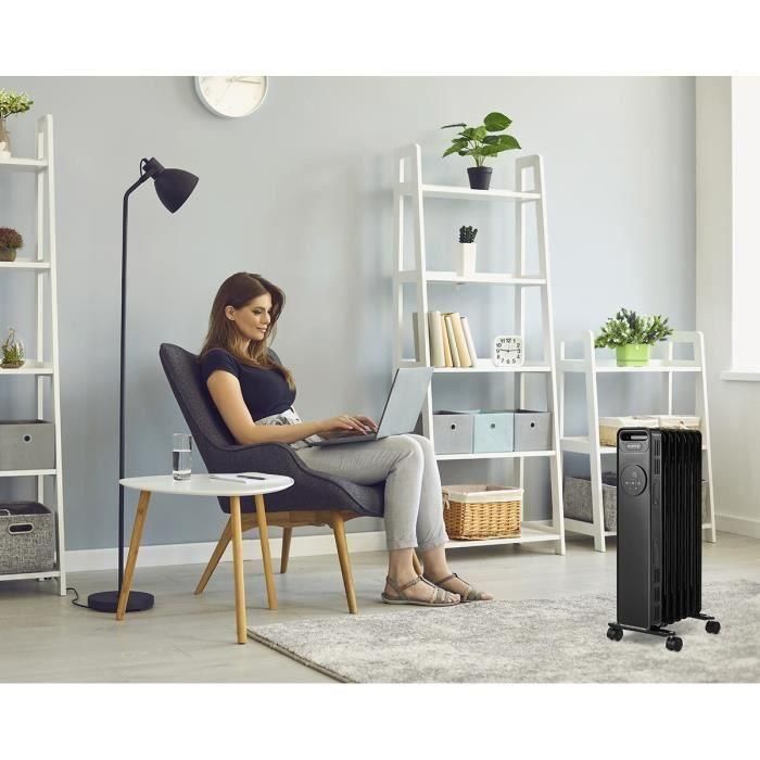 Radiador eléctrico baño de aceite 2500W OCEANIC - 3 potencias - Termostato electrónico - Mando a distancia - Móvil - Negro 4 Radiador eléctrico baño de aceite 2500W OCEANIC - 3 potencias - Termostato electrónico - Mando a distancia - Móvil - Negro 4