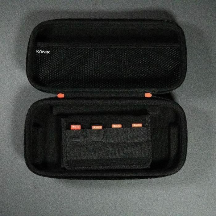 Konix 3328170304351 Estuche protector y de transporte para Consola Nintendo Switch 2, con red para accesorios y 8 compartimentos para juegos, Negro 6 Konix 3328170304351 Estuche protector y de transporte para Consola Nintendo Switch 2, con red para accesorios y 8 compartimentos para juegos, Negro 6