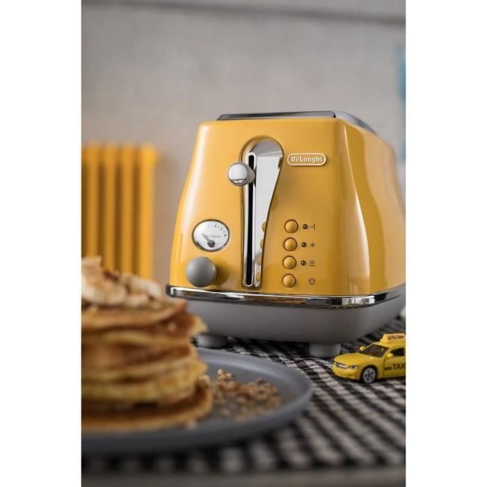 DELONGHI ICONA CAPITALS Tostadora 2 rebanadas - 900W - Tostadora 3 funciones - Calentador de repostería incluido - Amarillo 4 DELONGHI ICONA CAPITALS Tostadora 2 rebanadas - 900W - Tostadora 3 funciones - Calentador de repostería incluido - Amarillo 4