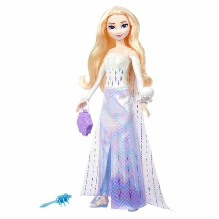 Muñeca frozen elsa spin and reveal. incluye 11 sorpresas 5 accesorios y 5 pegatinas con una escena de juego inspirada en la pelicula.