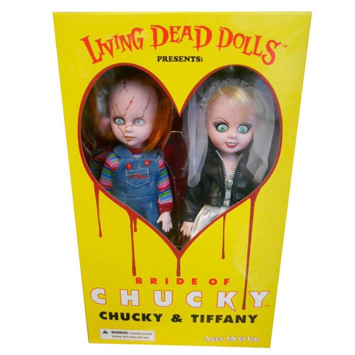 MEZCO TOYZ Muñecos Living Dead Dolls Chucky y Tiffany Set de 2, 25cm, articulados, PVC con ropa de tela