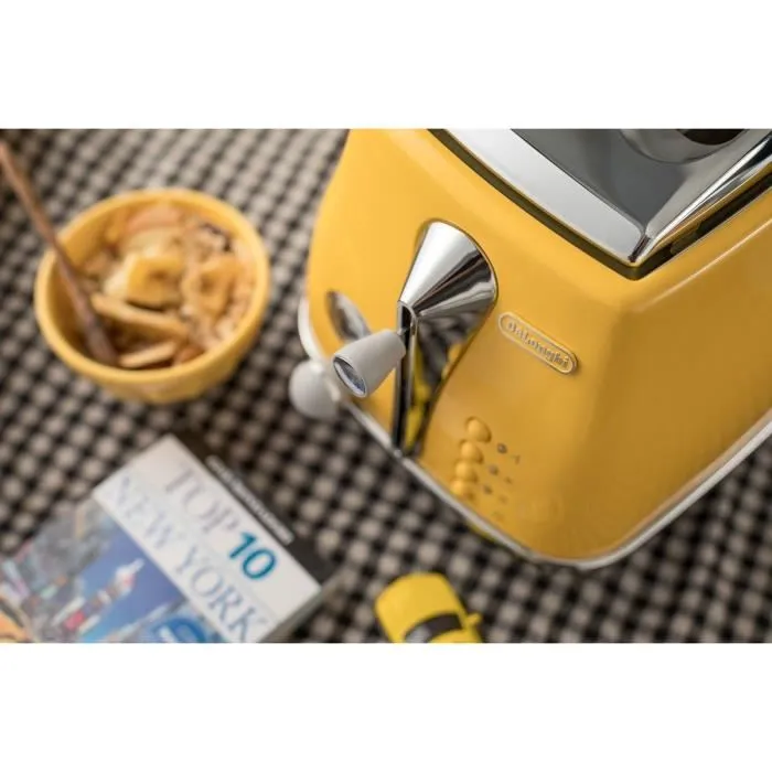 Delonghi DEL8004399762732 Tostadora 2 rebanadas 900W Tostadora 3 funciones Calentador de repostería incluido Amarillo 3