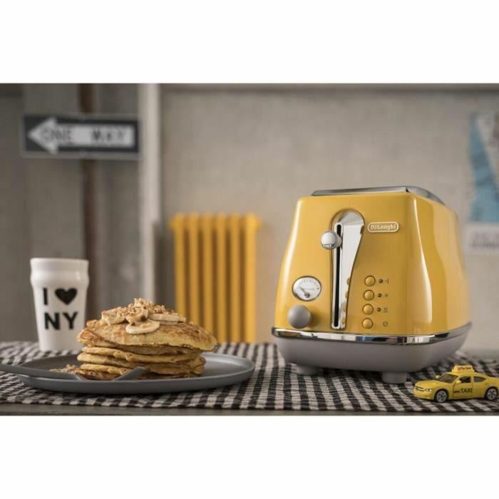 DELONGHI ICONA CAPITALS Tostadora 2 rebanadas - 900W - Tostadora 3 funciones - Calentador de repostería incluido - Amarillo 1