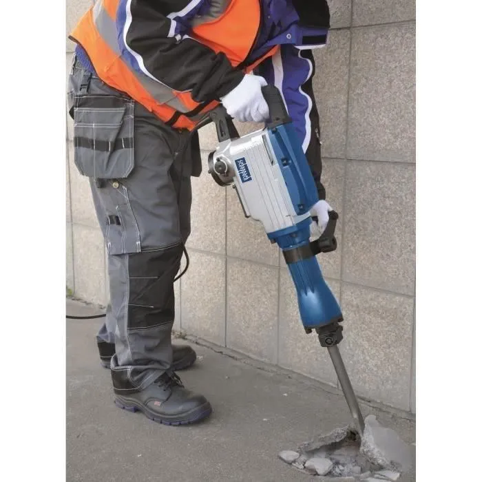 Scheppach AB1600 Martillo Neumático Rompedor 1600W 50 Joules con Caja de Metal y 2 Cinceles para Grandes Trabajos 1 Scheppach AB1600 Martillo Neumático Rompedor 1600W 50 Joules con Caja de Metal y 2 Cinceles para Grandes Trabajos 1