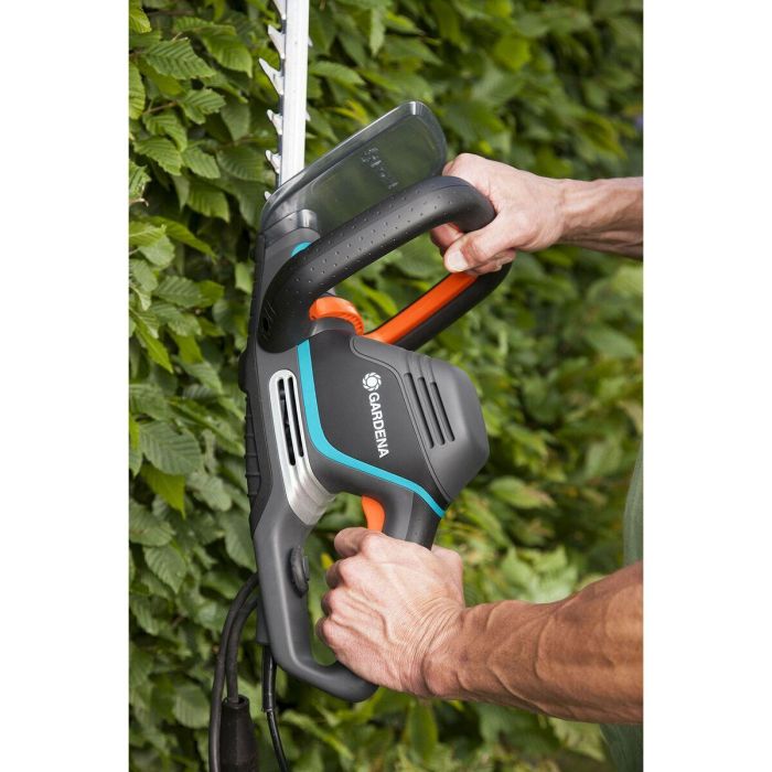 Gardena 9835-20 Cortasetos eléctrico PowerCut 700/65 de 700 W, potente para el asombroso recorte de setos. 3 Gardena 9835-20 Cortasetos eléctrico PowerCut 700/65 de 700 W, potente para el asombroso recorte de setos. 3