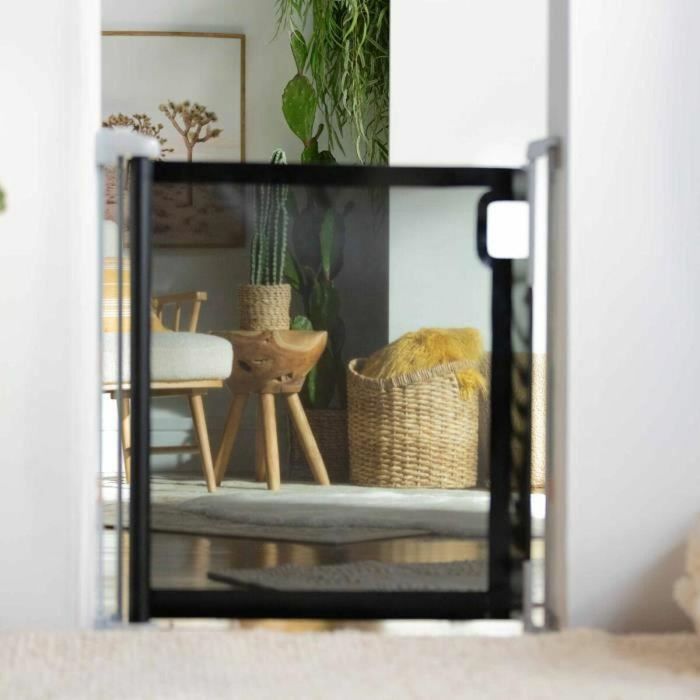 Ingenuity ING12914330340 Puerta de seguridad para niños, enrollable, hasta 136 cm, cierre automático, fácil de instalar 3