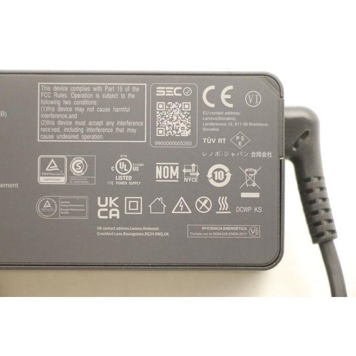 Lenovo 65W AC power adapter with multiple output voltages (20V, 15V, 9V, 5V), designed for Lenovo laptops, compact and portable. 4 Lenovo 65W AC power adapter with multiple output voltages (20V, 15V, 9V, 5V), designed for Lenovo laptops, compact and portable. 4