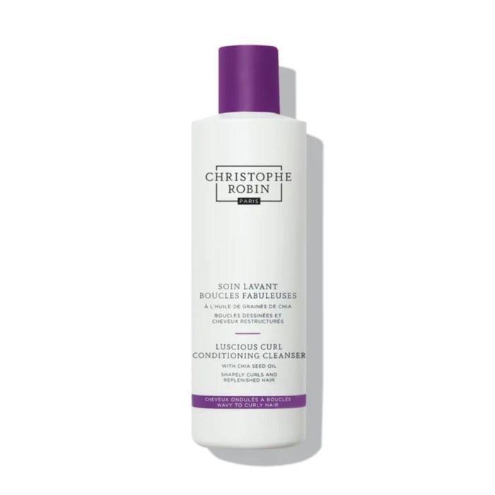 Christophe Robin Limpiador Acondicionador Luscious Curl para cabello rizado, aportando definición y brillo.