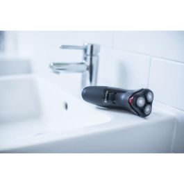 REMINGTON PR1330 POWER SERIES Afeitadora rotativa - 3 cabezales principales - Negro REMINGTON PR1330 POWER SERIES Afeitadora rotativa - 3 cabezales principales - Negro