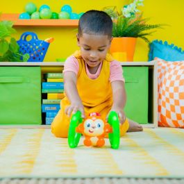 Bright Starts Little Roll & Glow Monkey - Juguete interacivo para bebés - Mono rodante que se ilumina