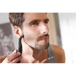 Philips MG1100 / 16 Recortadora de Precisión y Mini Afeitadora DualCut, 3 Peines Barba, Impermeable, Pilas AA