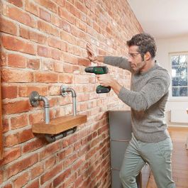 Bosch UniversalImpact 18 Taladro percutor con 2 baterías 1,5Ah, 20 posiciones de par, 2 velocidades, diseño ergonómico