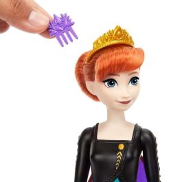 Muñeca frozen anna spin and reveal.incluye 11 sorpresas 5 accesorios y 5 pegatinas con una escena de juego inspirada en la pelicula.