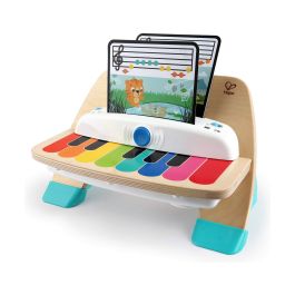 Piano magic touch madera baby einstein con tecnologia tactil incluye tres hojas de musica 22,9x30,5x12,7cm