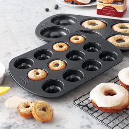 Molde para horno de rosquillas 12 unidades 4.5 cm Quttin (12 Unidades) Molde para horno de rosquillas 12 unidades 4.5 cm Quttin (12 Unidades)