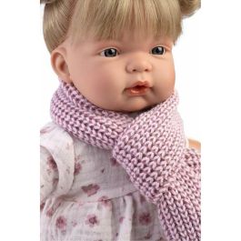 Muñeca llorona joelle chaqueta fuxia 38cm incluye chupete.cuerpo tela