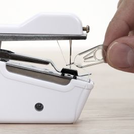 Maquina de coser portátil