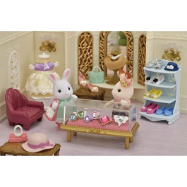 Sylvanian Families La maleta de moda Snow Bunny y Big Sister con accesorios de joyería