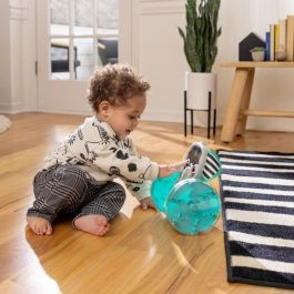 BABY EINSTEIN Juguete sobre ruedas Elefantito, Música y Luces, Interactivo y Multilingüe, Desarrollo de la motricidad