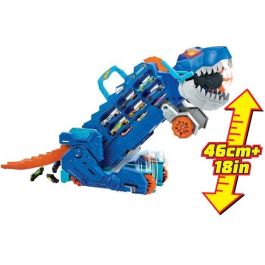 Camión hot wheels city t-rex definitivo. dinosaurio transporte y pista para coches de juguete. incluye 2 vehiculos.