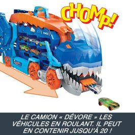 Camión hot wheels city t-rex definitivo. dinosaurio transporte y pista para coches de juguete. incluye 2 vehiculos.