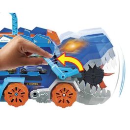 Camión hot wheels city t-rex definitivo. dinosaurio transporte y pista para coches de juguete. incluye 2 vehiculos.