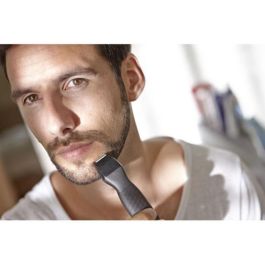Philips MG1100 / 16 Recortadora de Precisión y Mini Afeitadora DualCut, 3 Peines Barba, Impermeable, Pilas AA