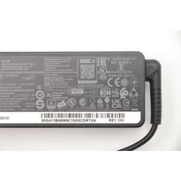 Lenovo 65W AC adapter with slim tip connector, 100-240V input, rectangular design, 89% efficiency, compatible with Lenovo devices. Lenovo 65W AC adapter with slim tip connector, 100-240V input, rectangular design, 89% efficiency, compatible with Lenovo devices.