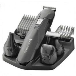 Remington Afeitadora eléctrica recargable pg6030 con cuchillas de acero inoxidable, 2 peines y 4 cabezales