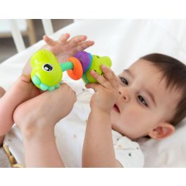 KioKids Mordedor Musical Dinosaurio Multicolor para Bebés con Sonajero, Gira 360º, Plástico Verde, Alivia Dentición +3 Meses