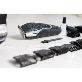 Cortapelos estanco - WAHL - AQUA GROOM - 6 W - 11 peines guía - Autonomía de batería: 3 h - Negro Cortapelos estanco - WAHL - AQUA GROOM - 6 W - 11 peines guía - Autonomía de batería: 3 h - Negro