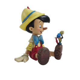 Enesco Figura Disney de Pinocho Sentado Precio: 44.5000006. SKU: B13RHRADTZ