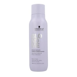 Schwarzkopf Blondme Bond Repair Acondicionador Tono Púrpura para Cabello Rubio o Gris 250 ml Precio: 16.50000044. SKU: B15KXJVKZJ