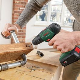 Bosch UniversalImpact 18 Taladro percutor con 2 baterías 1,5Ah, 20 posiciones de par, 2 velocidades, diseño ergonómico