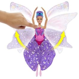 Muñeca barbie dreamtopia mariposa bailarina. la falda se convierte en coloridas alas al presionar el collar.